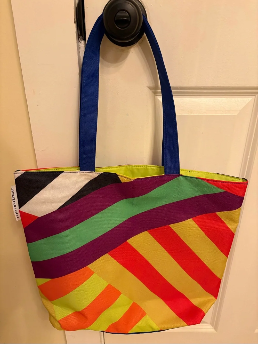 Clinique Multi-Color Diagonal Stripe Tote with Blue Handles